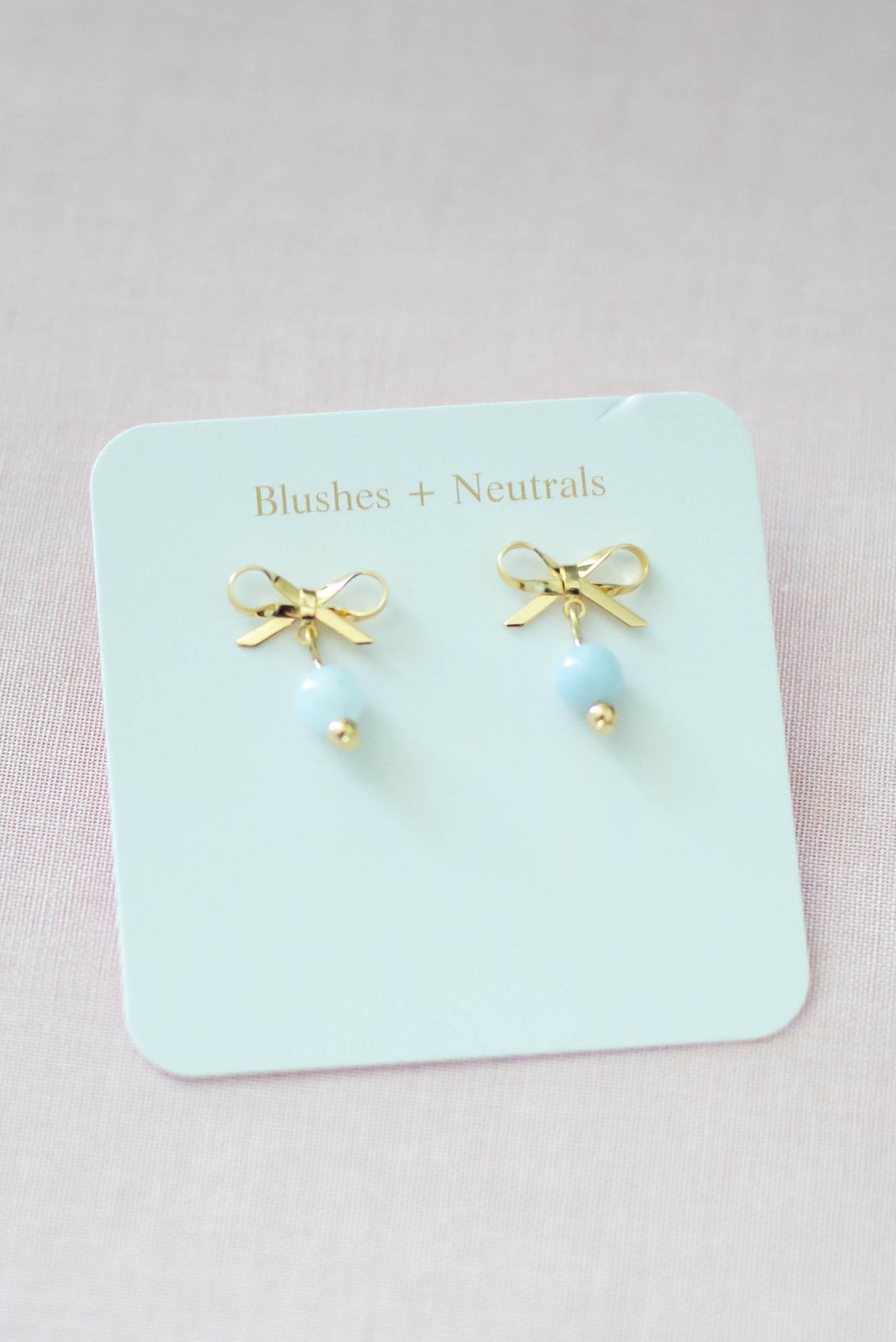 Gold Plated Bow Dangles with Light Blue Jade Gemstone | Petite Dangles