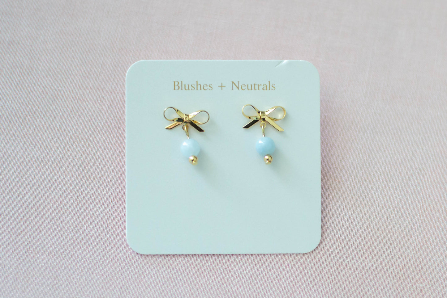 Gold Plated Bow Dangles with Light Blue Jade Gemstone | Petite Dangles