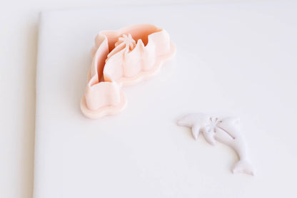 Palm Embossed Dolphin Cutter